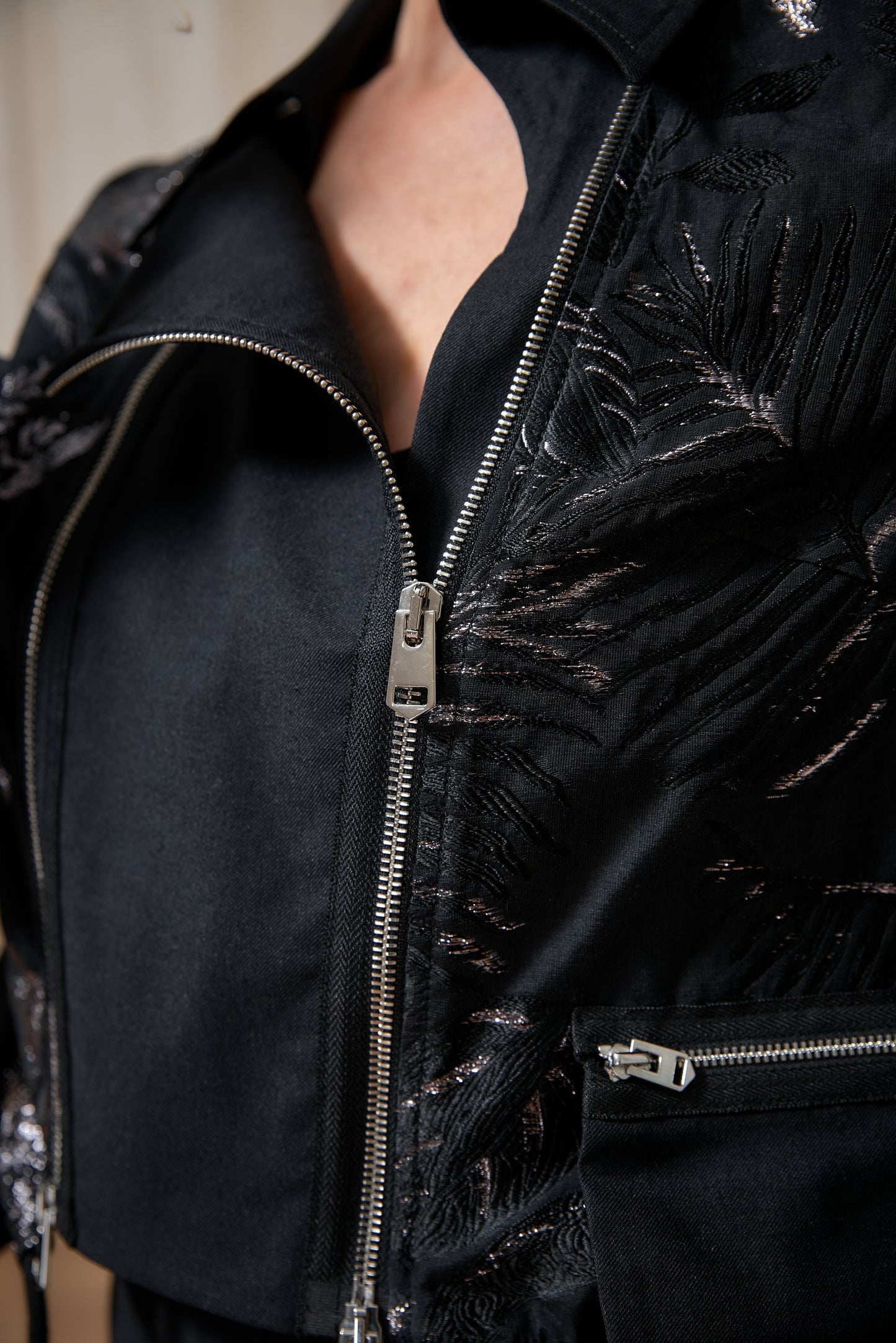 Cropped motorcycle-style jacket with long sleeves